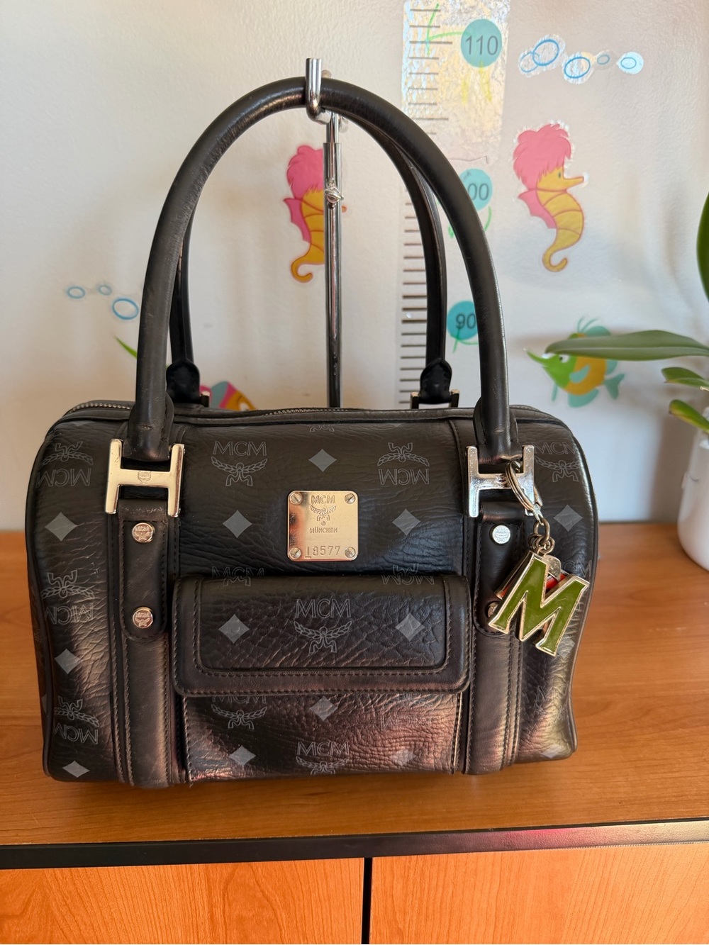 MCM Black Visetos Satchel with Green 'M' Charm